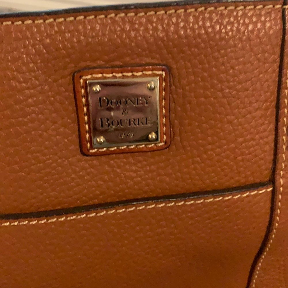 Dooney & Bourke pocketbook only used a few times